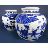 A pair of oriental blue and white painted ginger jars and covers with decoration of boys playing,