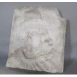 Carved, possibly granite, panel of a Guy Fawkes type character, 36 x 32cm