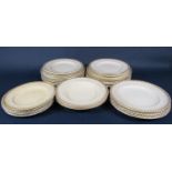 A collection of 19th century Mintons plates and soup plates of various size, all with gilt rope