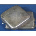 Early 20th century silver vesta case, together with a further later engine turned silver card