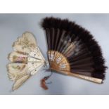 19th century sandalwood, satin and feather fan with gilt and silvered stencilled detail, with