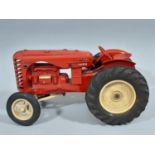 Model tractor Massey Harris 745D by Lesney in bright red with rubber tyres. Length 20cm. CR: