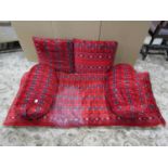 Six scatter cushions with Afghan style carpet appearance finish