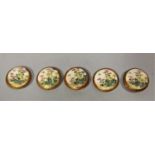 Five small satsuma porcelain buttons with hand painted floral detail within a gilded border