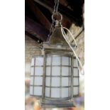 Good quality arts and crafts brass hall lantern with four domed sides and turreted top, 30cm high