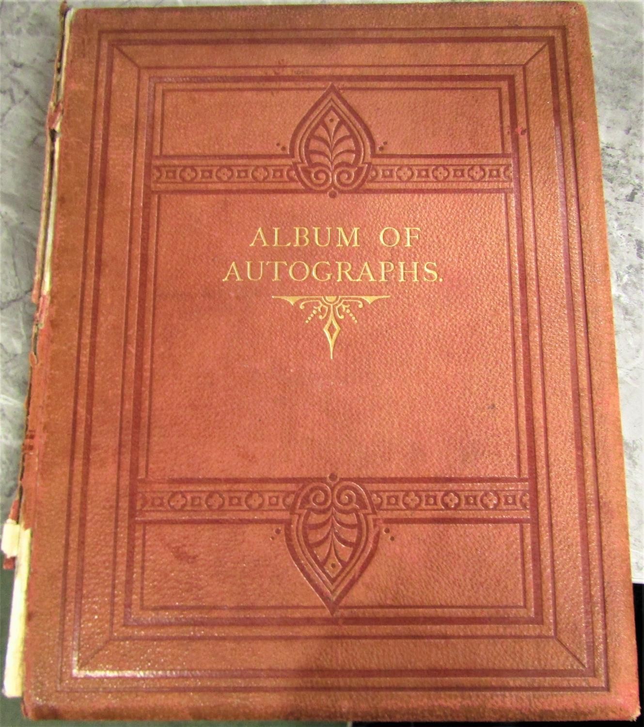 A box containing an album of autographs from the 19th century including the signature of Lord