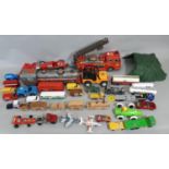 Mixed collection of unboxed vintage model vehicles including large tinplate fire engine, battery