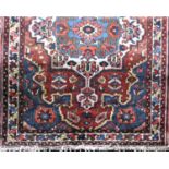 Persian village full pile rug with central floral block medallion, various colours, 205 x 140 cm