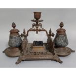 Good quality Victorian cast copper desk standish, with raised candle sconce over a pen brush,