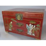 Chinese red lacquered jewellery casket, the top decorated with three ladies in an exterior
