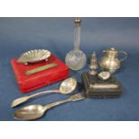 Mixed collection of silver comprising a small baluster pepper, a baby rattle, a cased scallop