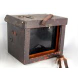 A leather cased collection of photographic exposure slides