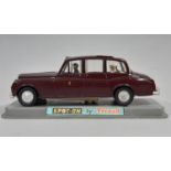 'Royal Rolls Royce' Spot-On model car by Tri-ang with maroon body, 4 figures within, and perspex