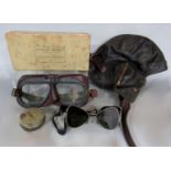 A vintage leather aviation hat and Mk. VIII Anti-Dimming goggles, together with a further set of