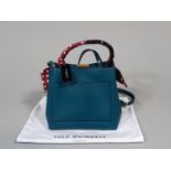 Hand bag by Lulu Guiness 'Ruby with Scarf' in emerald leather with scarf detail around handle, and
