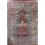 Antique Persian silk prayer mat with Islamic centre and running borders, washed ivory ground, 130
