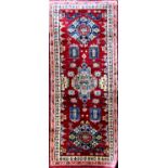 A contemporary but good quality Persian runner of small proportions with sky blue vegetable dye