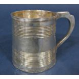 Georgian silver christening/small tankard of typical tapered form with banded decoration, maker
