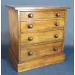 Mahogany apprentice or table top chest of drawers fitted with four long graduated drawers, 32cm high