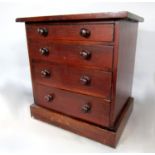 Mahogany apprentice chest of drawers, fitted with four long graduated drawers, 32cm high