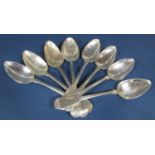 Set of seven George III silver fiddle pattern tablespoons, maker RC, London 1806; together with a