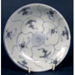 Early 19th century oriental blue and white dish from the Tek Sing cargo, with blue painted detail to