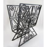 Good quality French wrought iron canterbury, with geometric metropolis type pierced sides, 60cm high