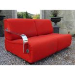 Fred Scott for Hille International Furniture, modular two seater sofa, with curved chrome arms and