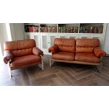 Unusual Italian 1960s tan leather sofa, with button back upholstery upon thick lucite/perspex