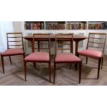 McIntosh teak extending dining table and four ladderback chairs, the table 75cm high x 152cm long