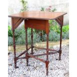 Early 20th century aesthetic period mahogany envelope occasional table by Bruce Talbert with