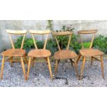 Set of four Ercol light elm staking chairs, 77 cm high x 40 cm wide (af)