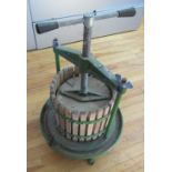 A Vigo Vineyard supplied fruit press with cast iron framework, 60cm high