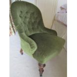 A half size Victorian drawing room chair upholstered in dralon with buttoned back on turned supports