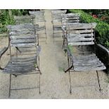 A set of six vintage folding garden armchairs with steel frames and teakwood lathe backs, seats