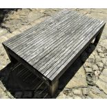 Good quality weathered teak low garden occasional table with slatted top, 115cm x 70cm x 33cm