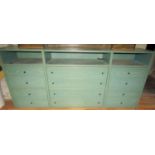 Contemporary side cabinet of six filing drawers beneath three open alcoves, 215cm long x 95cm high