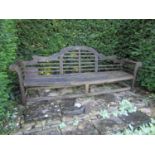 An old teak garden bench in the Lutyens manner (some restoration required) 260cm wide