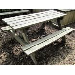 A weathered teak picnic table, 152cm long