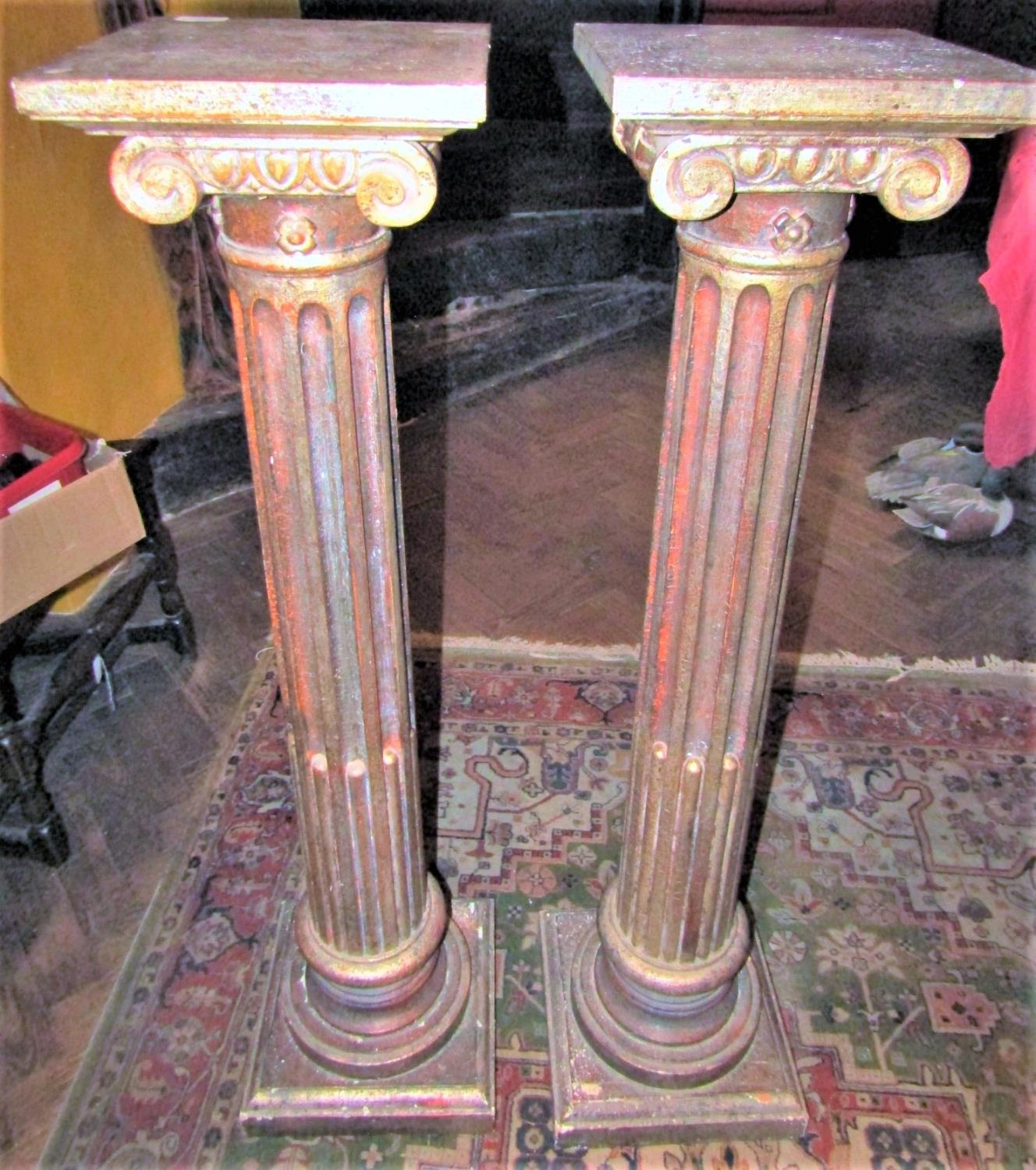 A pair of fluted columns or torcheres with ionic capitals and with antiqued finish, 110cm approx - Image 2 of 2