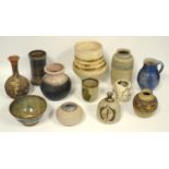 A group of studio pottery including crackle glazed vase, tenmoku bowl and others, some with makers