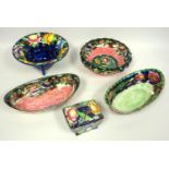 A small collection of Maling Pottery, two lustre boat shaped dishes, peony and mixed floral designs,