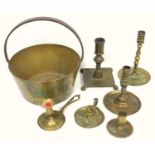 Cast brass candlestick on paw feet, other brass candlesticks and chamber sticks and a brass