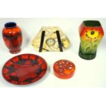 Decorative ceramics, including red glazed Poole pottery vase blossom decorated circular box, and
