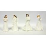 A group of Royal Doulton Christmas figures, Christmas Angel HN 3733, Parcels HN 3493, Christmas
