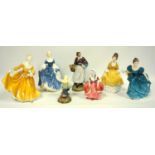 Group of Royal Doulton figures, Kirsty, Hilary, Rhapsody, Coralie and Goodie two shoes, Country Lass