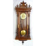 Viennese regulator wall clock, in mahogany frame the gilt metal and enamel dial with Roman numerals,