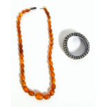An amber bead necklace 17.2 grams, others, cherry red bakelite type beads 44 grams, New images!!