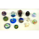Group of glass paperweights, one with cut canes, examples by Mdina, Caithness and others (12)