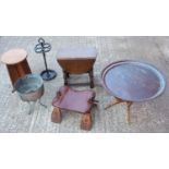 Eastern brass tray on stand, a 'camel' seat, a cast iron stick stand, small oak drop flap table